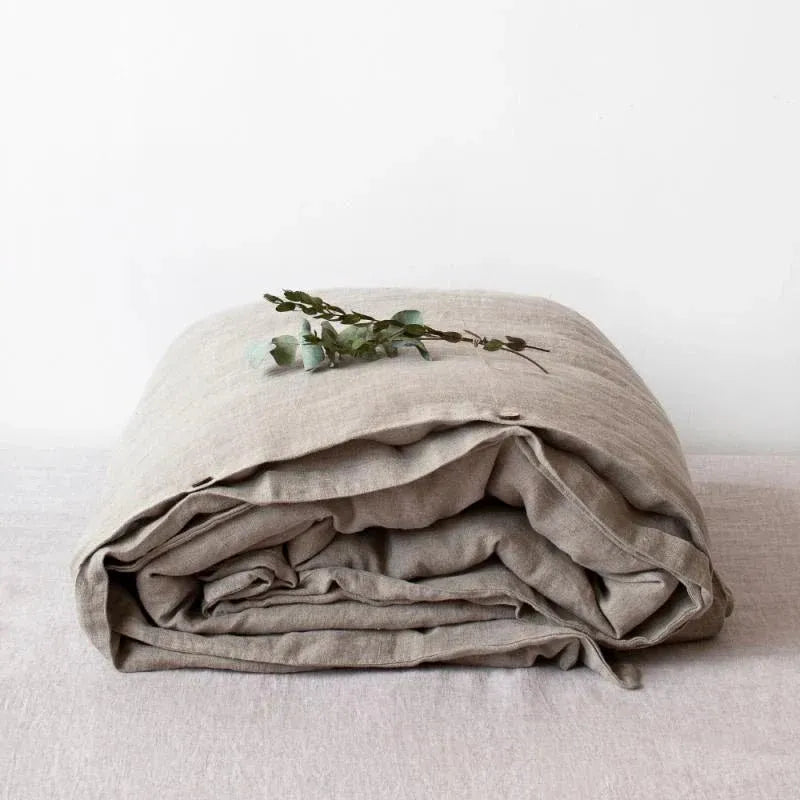 Natural linen duvet cover on a bed