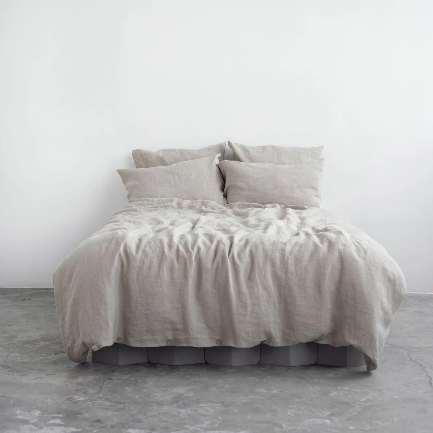 Natural linen duvet cover set on a bed