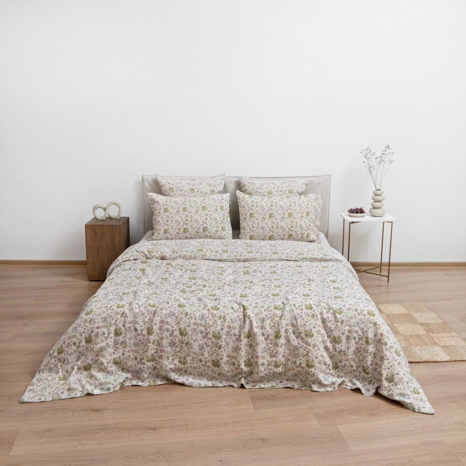 Botany leaf-print linen duvet cover set on a bed